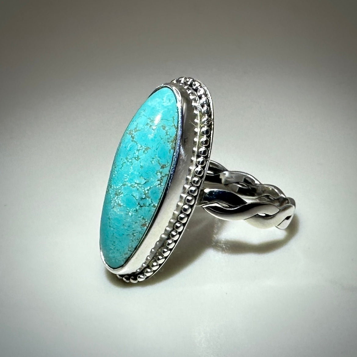Number 8 mine Turquoise in Sterling Silver size 7 band