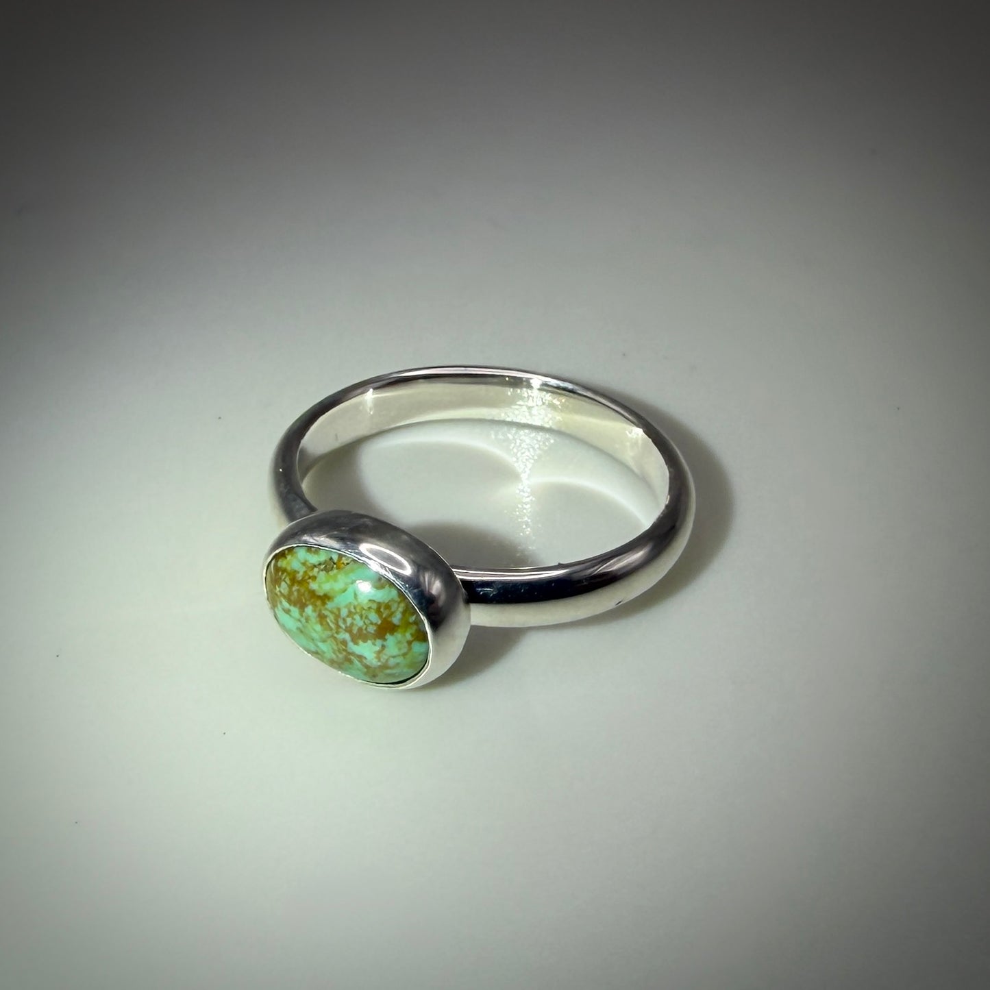 Kingman Turquoise set in Sterling Silver size 7.5 band