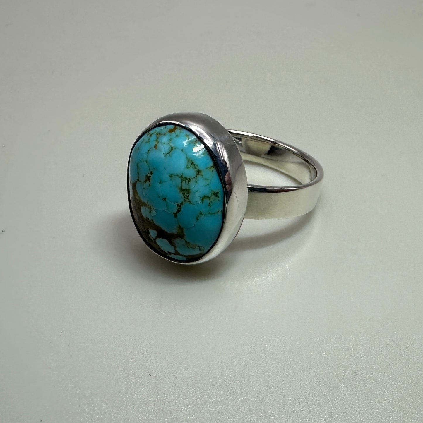 Number 8 mine Turquoise in Sterling Silver size 7 band