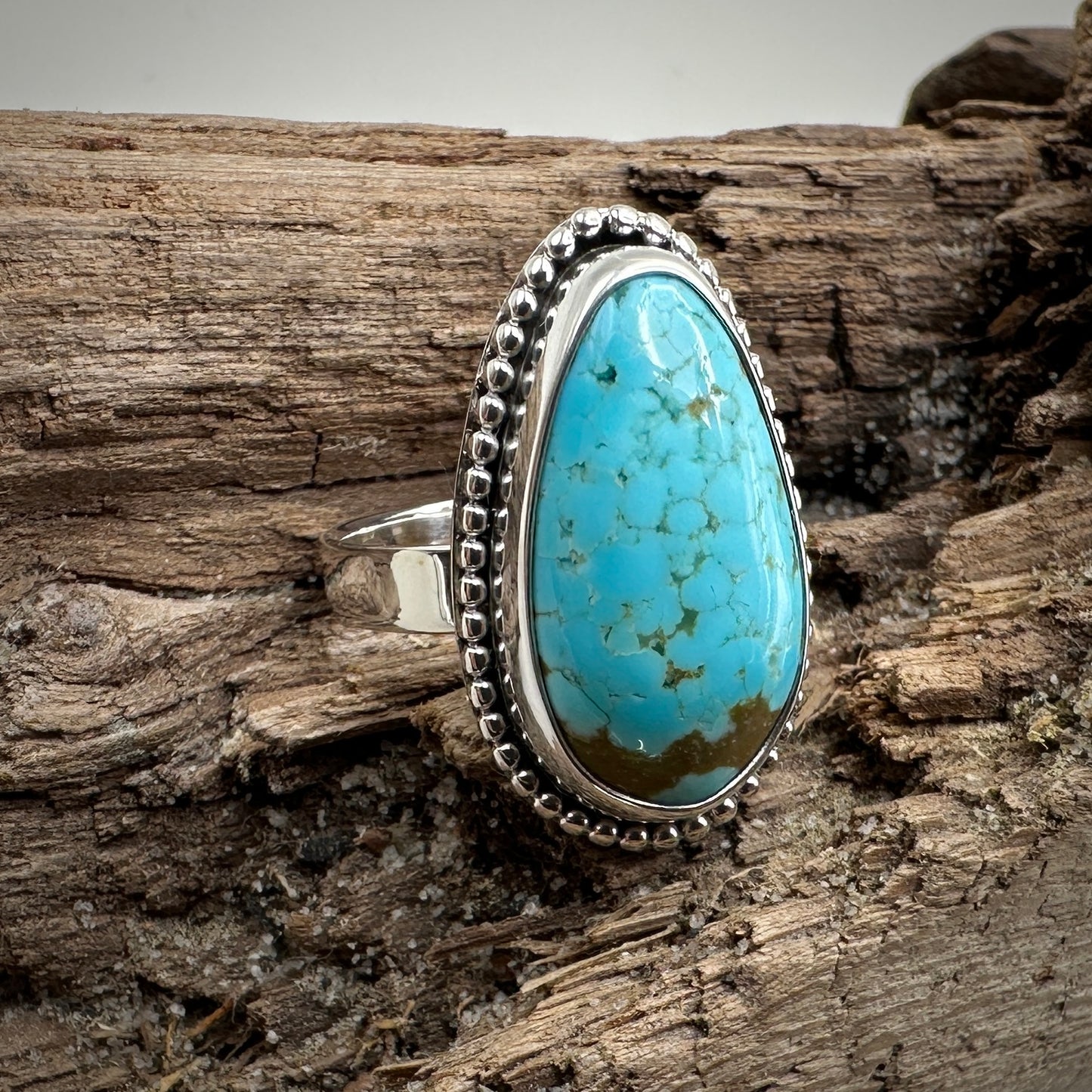 Number 8 mine Turquoise in Sterling Silver size 7 band