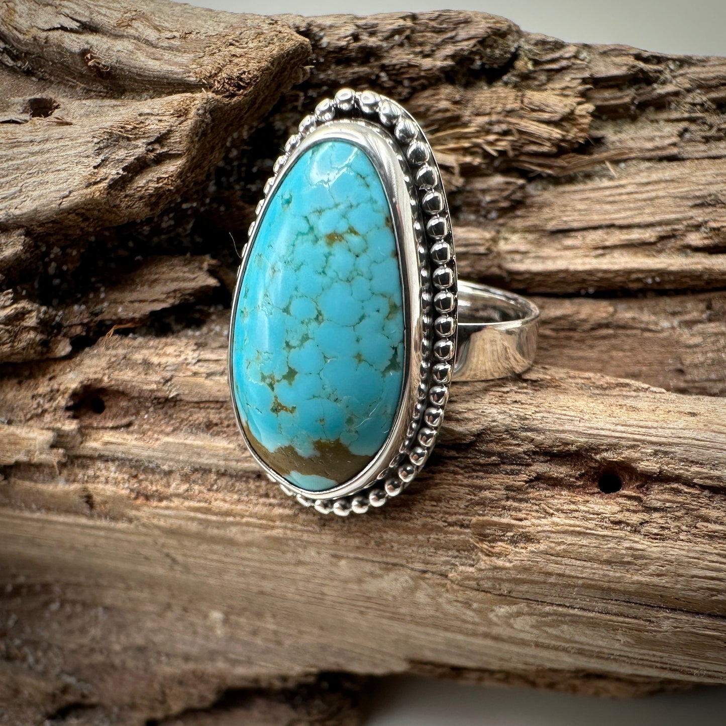 Number 8 mine Turquoise in Sterling Silver size 7 band
