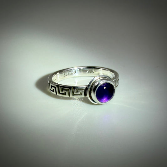 Amethyst set in Sterling Silver size 7.5 band