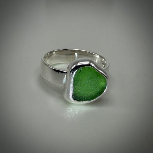 Natural Sea Glass (Monterey beach) set in Sterling Silver size  8 band