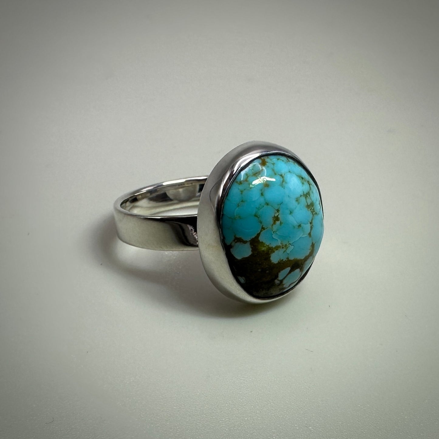 Number 8 mine Turquoise in Sterling Silver size 7 band