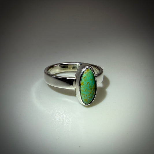 Kingman Turquoise set in Sterling Silver size 6 band