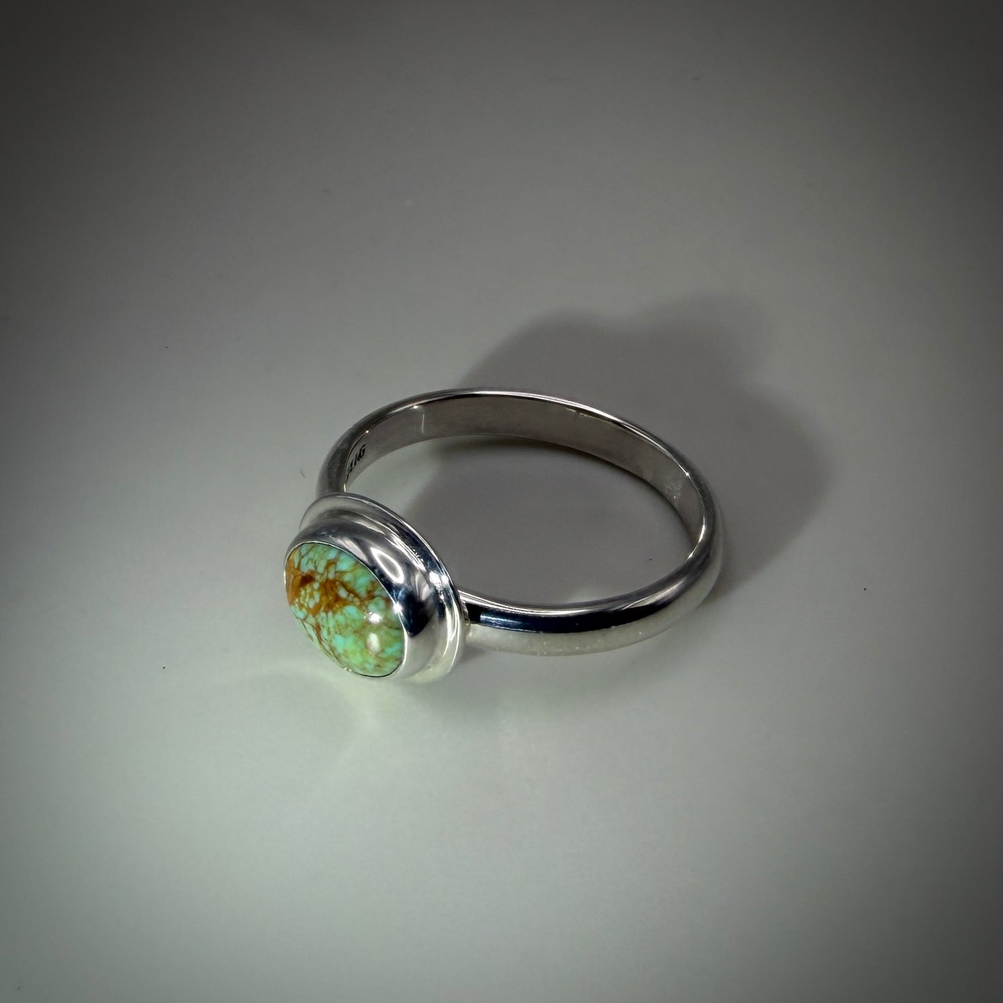 Kingman Turquoise set in Sterling Silver size 9 band