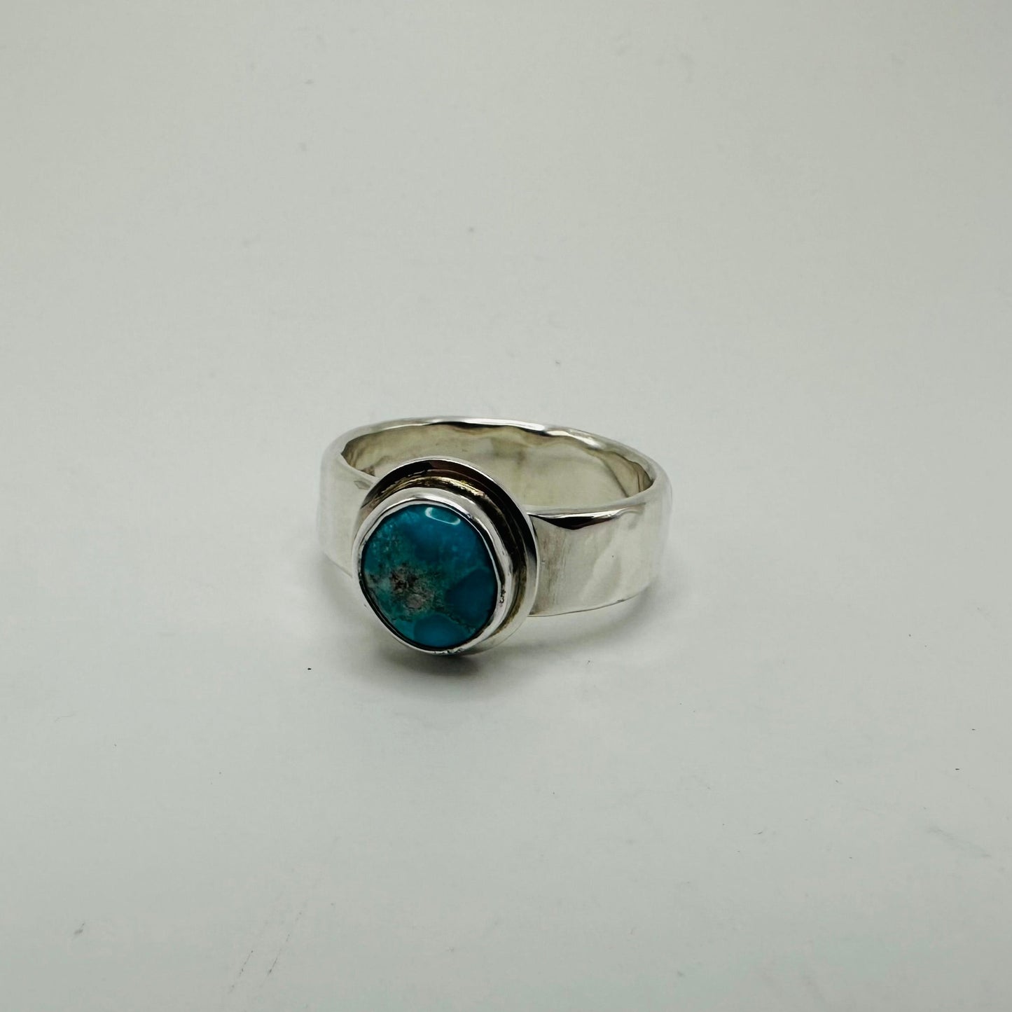 White Water Turquoise set in Hammered Sterling band size 7.75