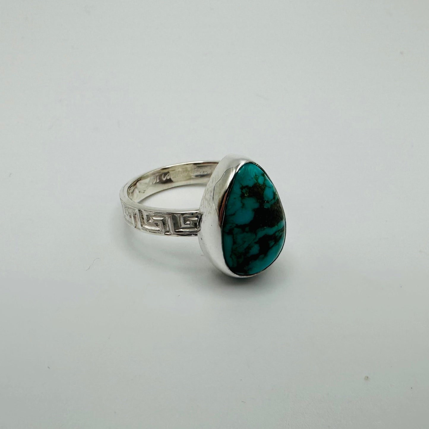 Kingman Turquoise set in Sterling Silver size 7 band